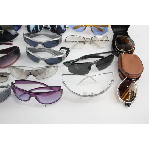 441 - 25 x Assorted SPORTS STYLE Sunglasses Inc Bloc, Bolle, Maui Jim etc