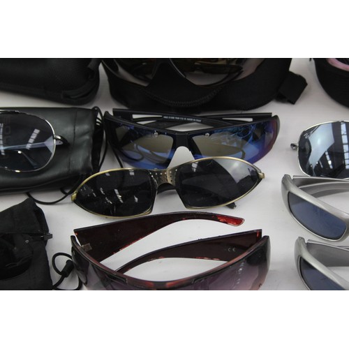 441 - 25 x Assorted SPORTS STYLE Sunglasses Inc Bloc, Bolle, Maui Jim etc