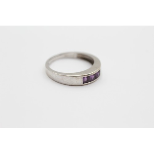 502 - 9ct White Gold Amethyst Trilogy Channel Set Band Ring (2.4g) - Size O