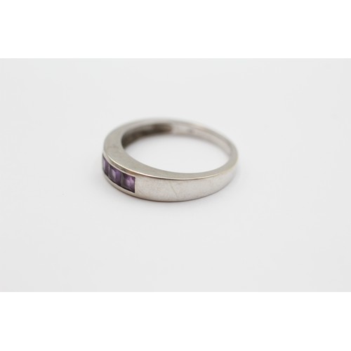 502 - 9ct White Gold Amethyst Trilogy Channel Set Band Ring (2.4g) - Size O