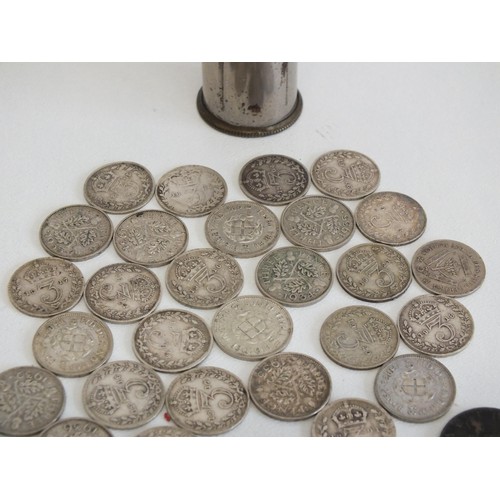 364 - 35 SILVER THREE PENCE COINS IN A MAGIC POCKET SAVINGS BANK