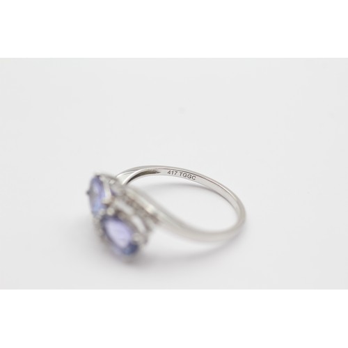 547 - 9ct White Gold Diamond And Tanzanite Toi & Moi Two Stone And Bypass Shoulders Set (2g) - Size M