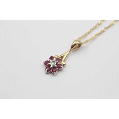 574 - 9ct White And Yellow Gold Diamond And Ruby Flower Cluster Pendant Necklace (1.7g)