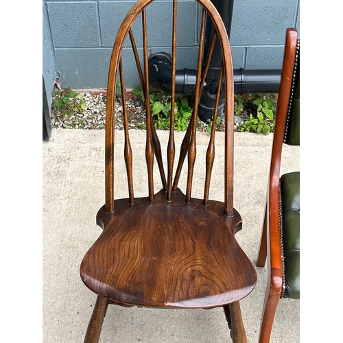 396 - GREEN LEATHER CHESTERFIELD CHAIR AND A SPINDLEBACK CHAIR