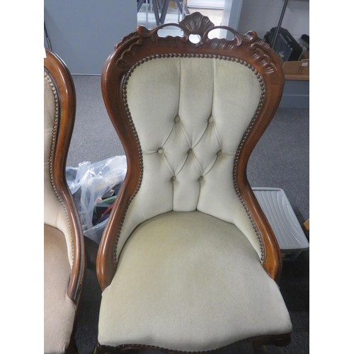 394 - TWO UPHOLSTERED SPOON BACK CHAIRS