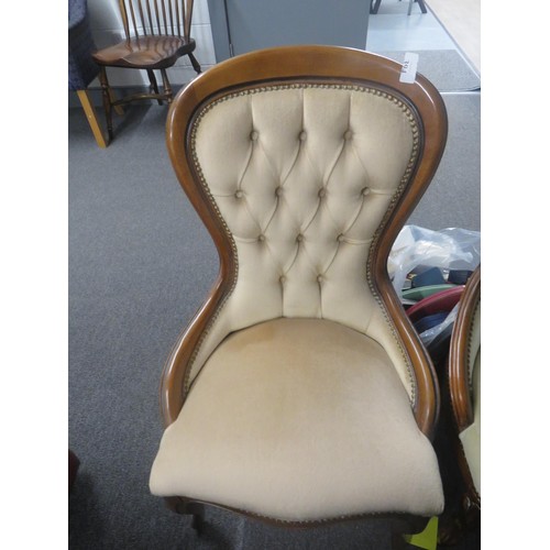 394 - TWO UPHOLSTERED SPOON BACK CHAIRS