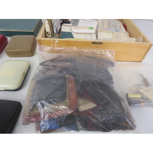 136 - QUANTITY OF LIGHTER SPARE PARTS, CASES, POUCHES AND PAPERWORK