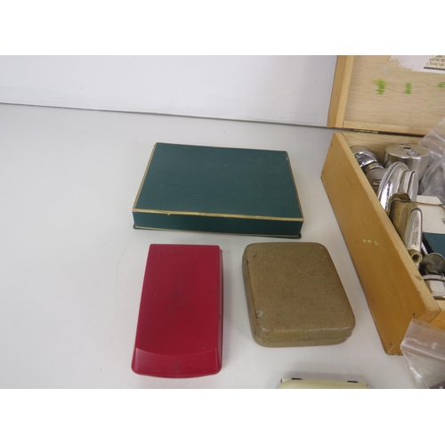 136 - QUANTITY OF LIGHTER SPARE PARTS, CASES, POUCHES AND PAPERWORK