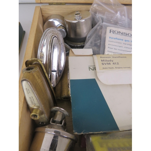 136 - QUANTITY OF LIGHTER SPARE PARTS, CASES, POUCHES AND PAPERWORK