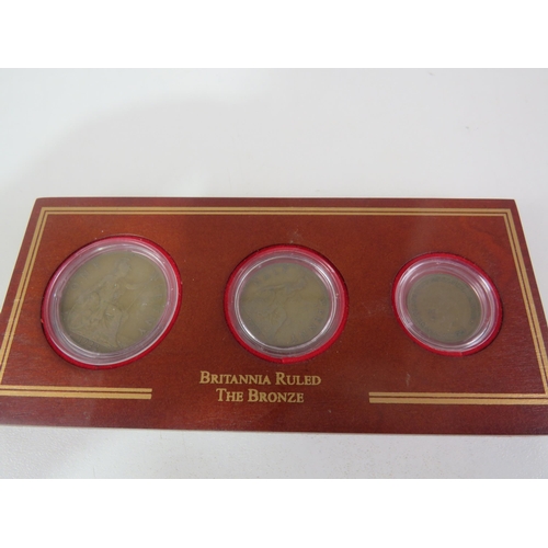 53 - DANBUCRY MINT BRITISH COIN TREASURES COIN COLLECTION COINS IN WOODEN CAPSULE PANELS INA DELUXE GLASS... 