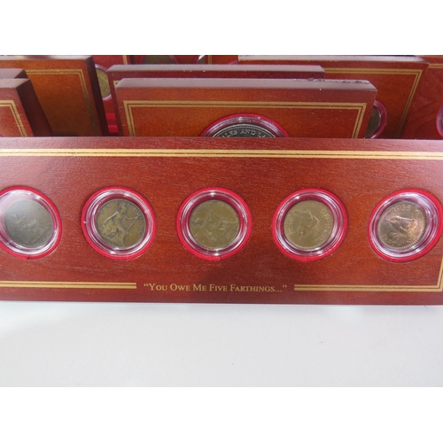 53 - DANBUCRY MINT BRITISH COIN TREASURES COIN COLLECTION COINS IN WOODEN CAPSULE PANELS INA DELUXE GLASS... 