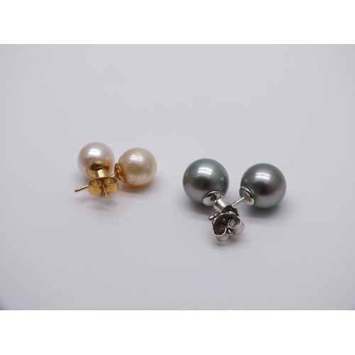 91 - TWO PAIRS OF CULTURED PEARL STUD EARRINGS WITH 18ct GOLD PEG & SCROLL FITTINGS