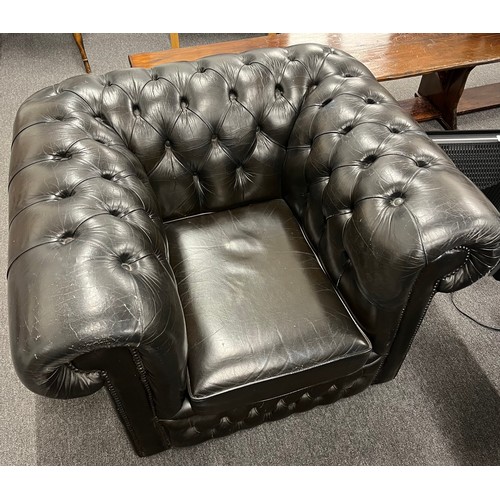 591 - BLACK LEATHER ARMCHAIR