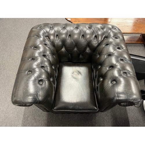 591 - BLACK LEATHER ARMCHAIR