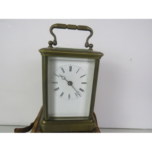 102 - CASED BRASS CARRIAGE CLOCK - WORKING