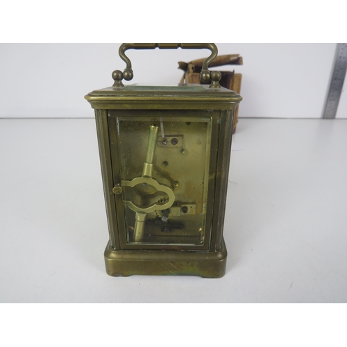 102 - CASED BRASS CARRIAGE CLOCK - WORKING