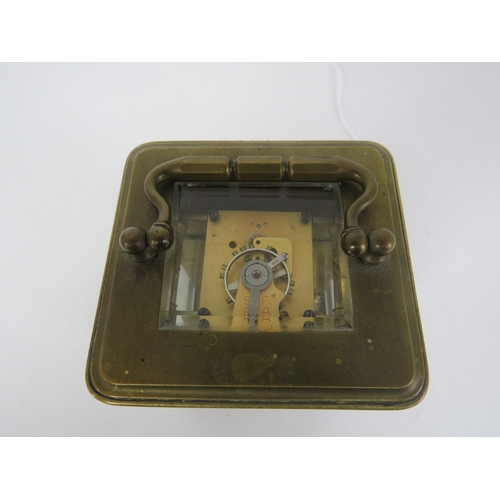 102 - CASED BRASS CARRIAGE CLOCK - WORKING