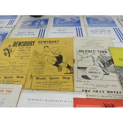 103 - SMALL BROWN LEATHER SUITCASE FULL OF OLD FOOTBALL PROGRAMMES 50's AND 60's INCLUDES LEEDS UNITED, HU... 