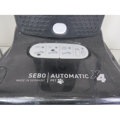 311 - SEBO AUTOMATIC HOOVER WITH ATTACHMENTS and 8 BOXES OF ULTRABAGS