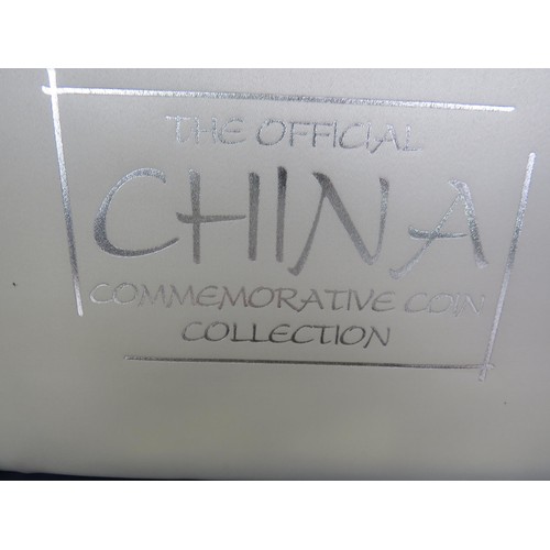 64 - COLLECTORS COINS INCLUDES CHINA COMMEMORATIVE COIN COLLECTION, DENMARK COVER COINS AND COIN SET etc