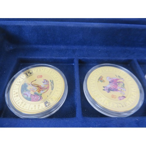 64 - COLLECTORS COINS INCLUDES CHINA COMMEMORATIVE COIN COLLECTION, DENMARK COVER COINS AND COIN SET etc