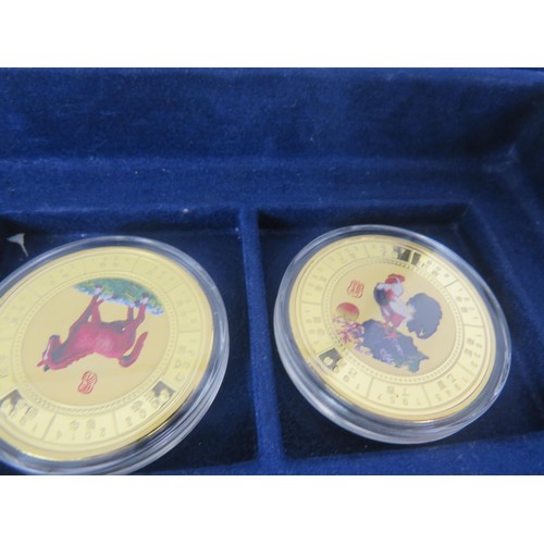 64 - COLLECTORS COINS INCLUDES CHINA COMMEMORATIVE COIN COLLECTION, DENMARK COVER COINS AND COIN SET etc