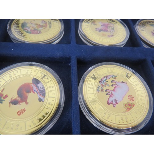 64 - COLLECTORS COINS INCLUDES CHINA COMMEMORATIVE COIN COLLECTION, DENMARK COVER COINS AND COIN SET etc