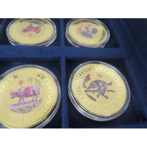 64 - COLLECTORS COINS INCLUDES CHINA COMMEMORATIVE COIN COLLECTION, DENMARK COVER COINS AND COIN SET etc