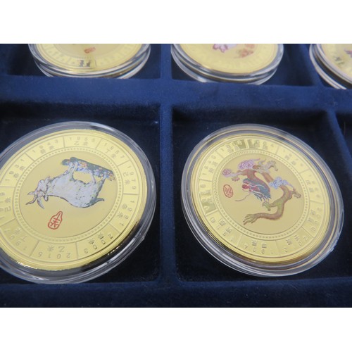 64 - COLLECTORS COINS INCLUDES CHINA COMMEMORATIVE COIN COLLECTION, DENMARK COVER COINS AND COIN SET etc