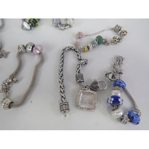 209 - SELECTION OF FASHION CHARM BRACELETS AND NECKLACES