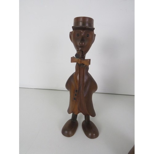 169 - THREE WOODEN ITALIAN FIGURES