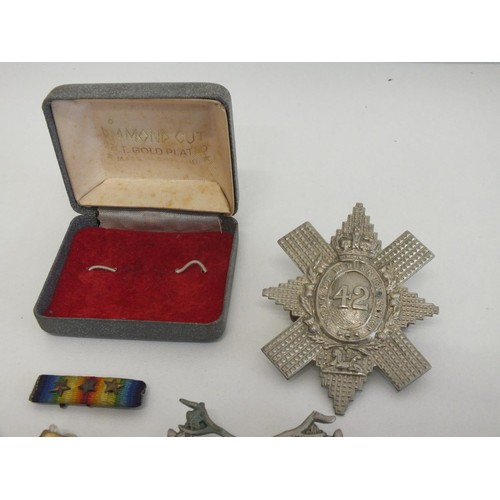 186 - MILITARY CAP BADGES AND MEDALS