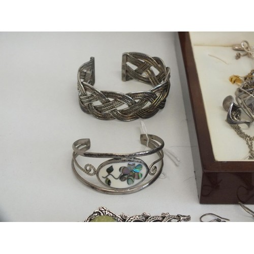 182 - BOX OF SILVER JEWELLERY INCLUDES BANGLES, RINGS, EARRINGS, NECKLACES etc