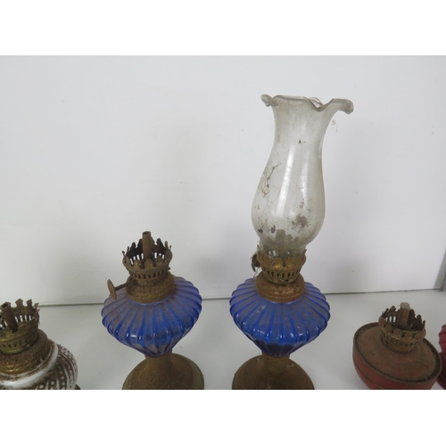 287 - MISCELLANEOUS ITEMS INCLUDES OIL LAMPS, METAMIC CLOCK, CHINESE CLOISONNE EGGS ETC