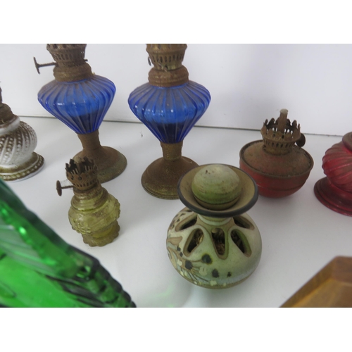 287 - MISCELLANEOUS ITEMS INCLUDES OIL LAMPS, METAMIC CLOCK, CHINESE CLOISONNE EGGS ETC