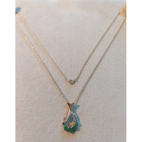 253 - 9ct Gold Diamond & Emerald Pendant 18