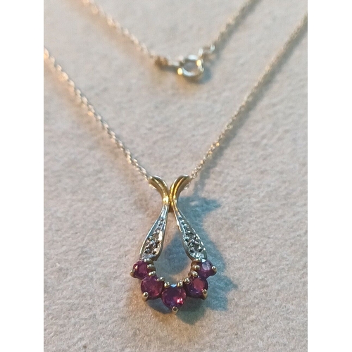 254 - 9ct Gold Diamond & Ruby Pendant 17