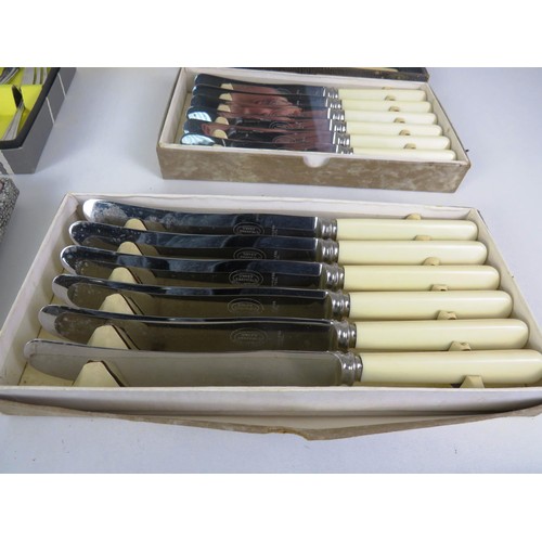 352 - TWO TRAYS OF BOXED CUTLERY AND CANTEEN CUTLERY SETS