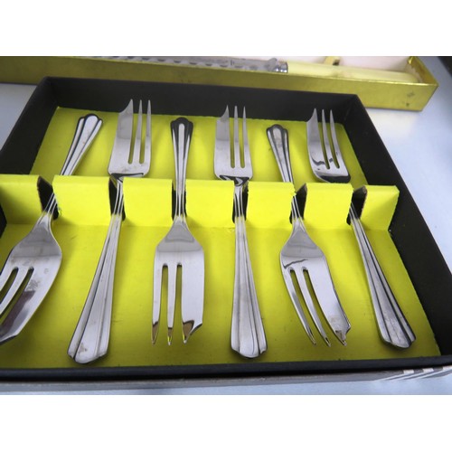 352 - TWO TRAYS OF BOXED CUTLERY AND CANTEEN CUTLERY SETS