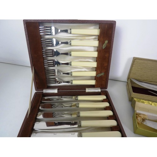 352 - TWO TRAYS OF BOXED CUTLERY AND CANTEEN CUTLERY SETS