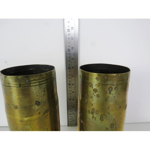 353 - PAIR OF MILITARY BRASS SHELLS