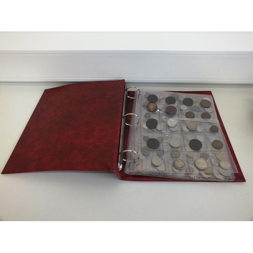 398 - FOLDER CONTAINING SIX SHEETS OF VARIOUS COUNTRY COINS