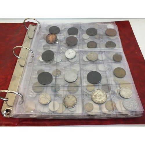 398 - FOLDER CONTAINING SIX SHEETS OF VARIOUS COUNTRY COINS