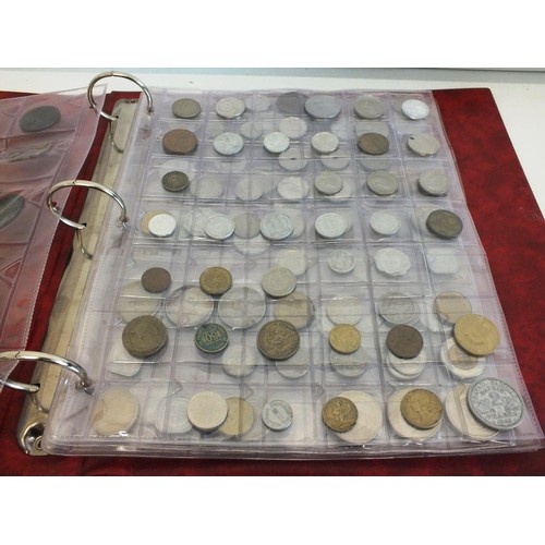 398 - FOLDER CONTAINING SIX SHEETS OF VARIOUS COUNTRY COINS