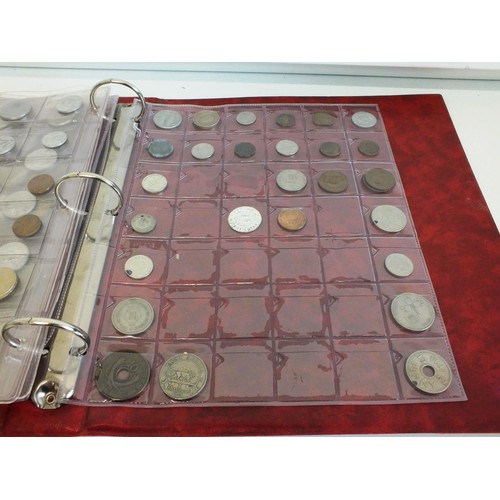 398 - FOLDER CONTAINING SIX SHEETS OF VARIOUS COUNTRY COINS