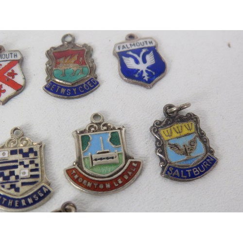 195 - 11 x STERLING SILVER ENAMEL SOUVENIER CHARMS