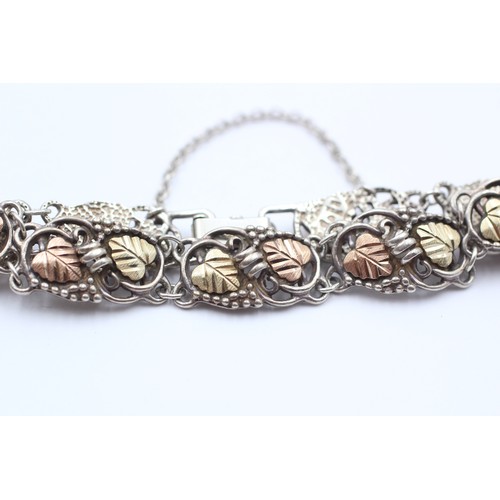 438 - 12ct Gold & Silver Fancy Link Bracelet With Leaf Motif (20.2g)