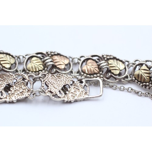 438 - 12ct Gold & Silver Fancy Link Bracelet With Leaf Motif (20.2g)