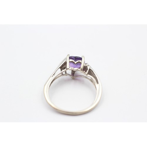 446 - 9ct White Gold Amethyst Heart Single Stone Ring With Diamond Sides (1.7g)- SIZE K