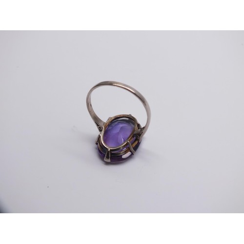 77 - 18CT WHITE GOLD AMETHYST RING